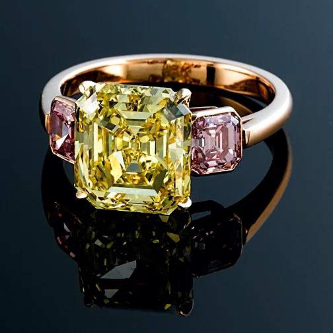 Emerald cut, Fancy Vivid Yellow and Pink Diamond Ring