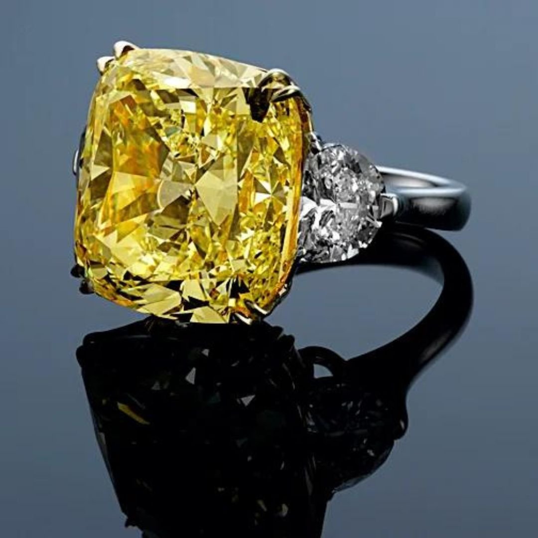 23 carat Fancy Intense Yellow Cushion cut Diamond Ring